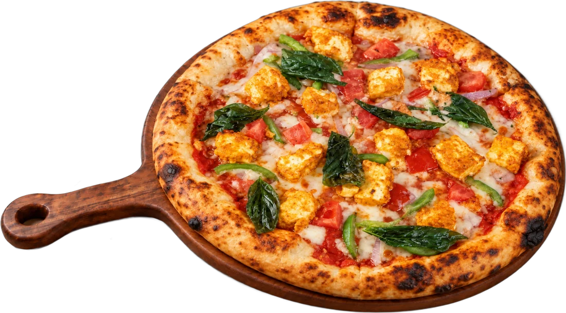 Paneer Tikka pizza on a wooden board